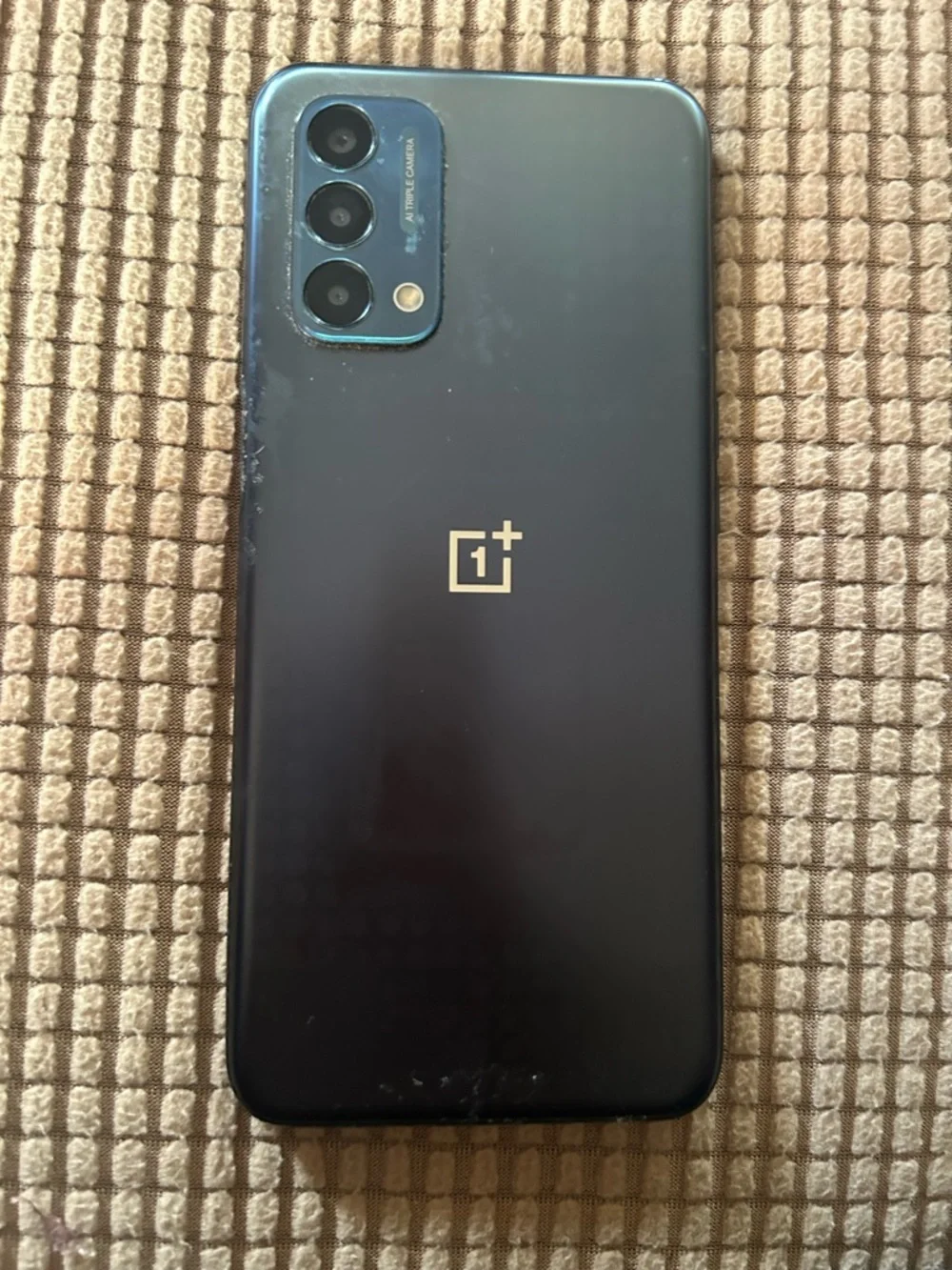 Motorola Black Phone with Blue Logo Display for metro pcs.